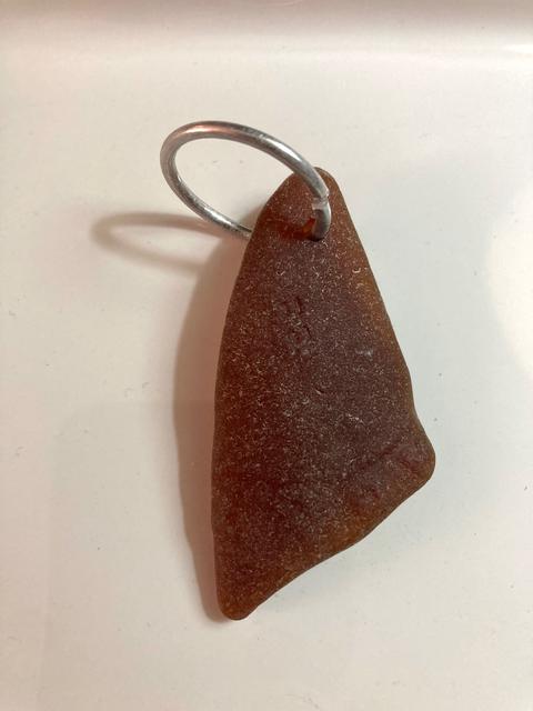 beach glass drilled glass holding